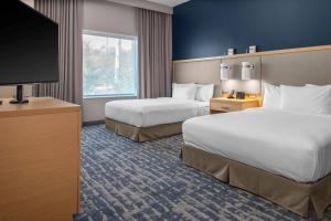เตียงในห้องที่ Residence Inn by Marriott Jekyll Island