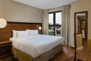 Katil atau katil-katil dalam bilik di Protea Hotel by Marriott Ikeja Select