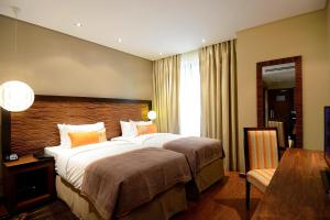 Katil atau katil-katil dalam bilik di Protea Hotel by Marriott Ikeja Select