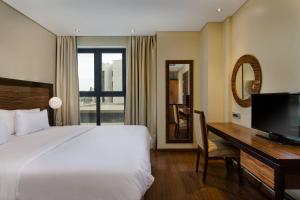 Katil atau katil-katil dalam bilik di Protea Hotel by Marriott Ikeja Select