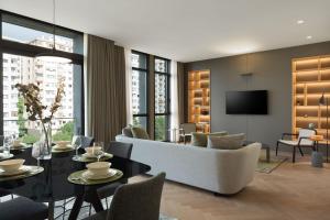 a living room with a couch and a table at Marriott Executive Apartments Istanbul Fulya in Istanbul