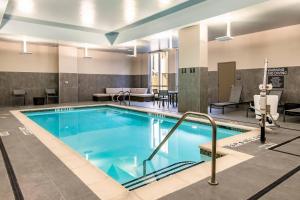 a large swimming pool in a hotel room at Residence Inn by Marriott Houston Medical Center/NRG Park in Houston