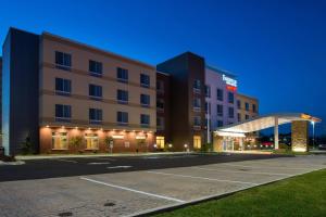 an empty parking lot in front of a hotel at Fairfield Inn & Suites by Marriott Akron Stow in Stow