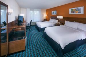 Un pat sau paturi într-o cameră la Fairfield Inn & Suites by Marriott Dover