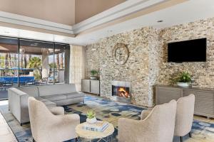 a living room with a couch and a fireplace at Marriott's Desert Springs Villas I in Palm Desert