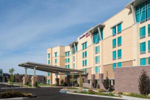 an image of a hotel with a gas station at SpringHill Suites by Marriott Kennewick Tri-Cities in Kennewick