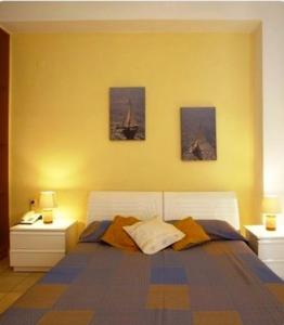 Posteľ alebo postele v izbe v ubytovaní Morpheas Apartments