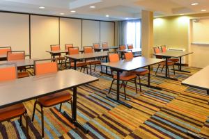 a classroom with tables and chairs in a room at Fairfield Inn & Suites by Marriott Lexington Georgetown/College Inn in Georgetown