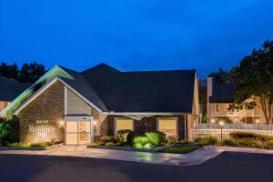 a house with a sign that says resident inn at Residence Inn Hartford Windsor in Windsor