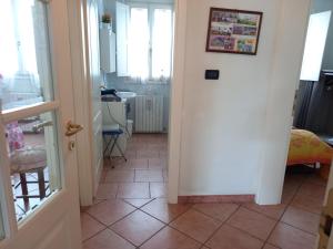 Postel nebo postele na pokoji v ubytování 4 giugno Ferrara