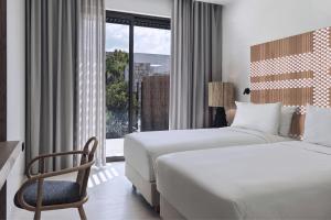 Voodi või voodid majutusasutuse W Costa Navarino toas