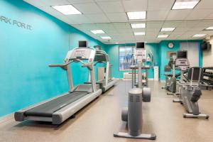 a gym with several tread machines in a room at Fairfield Inn & Suites Temecula in Temecula