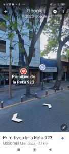a picture of a street with a sign on a city at Hermoso departamento en Mendoza in Mendoza