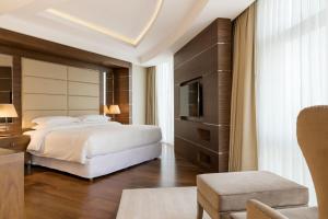 Ένα ή περισσότερα κρεβάτια σε δωμάτιο στο Four Points by Sheraton Ikot Ekpene