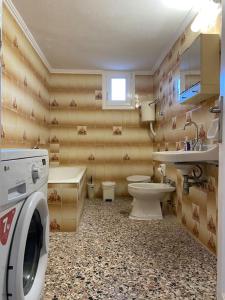 Koupelna v ubytování Case di Stavros 2