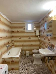 Koupelna v ubytování Case di Stavros 2 + 7 fotografií