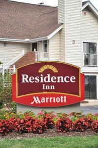 a sign for a residence inn marriot in front of a house at Residence Inn Richmond West End in Richmond