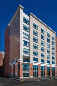 a large office building with a lot of windows at Fairfield by Marriott Pittsburgh Downtown in Pittsburgh