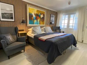 Postel nebo postele na pokoji v ubytování Skaftö Hotell Villa Lönndal, Grundsund