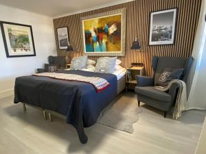 Postel nebo postele na pokoji v ubytování Skaftö Hotell Villa Lönndal, Grundsund