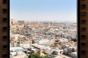a view of a city from a window at Four Points By Sheraton Riyadh Khaldia in Riyadh