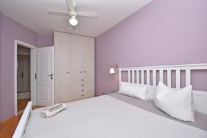 Ένα ή περισσότερα κρεβάτια σε δωμάτιο στο Old Dalmatian House with Jacuzzi Martine