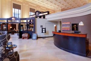 a lobby with a bar in a building at Residence Inn Columbus Downtown in Columbus