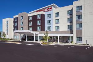 una representación de un edificio de hotel con aparcamiento en TownePlace Suites by Marriott Knoxville Oak Ridge, en Oak Ridge