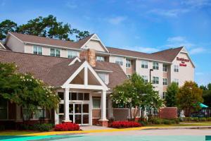 uma representação de um hotel com um edifício em Residence Inn by Marriott Covington Northshore em Covington