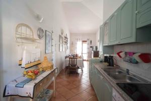 A kitchen or kitchenette at Maiorca Sea-view Apartment