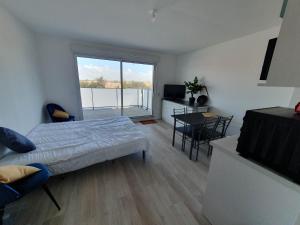Posteľ alebo postele v izbe v ubytovaní appartement remblai saint hilaire de riez