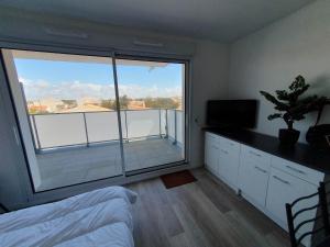 Posteľ alebo postele v izbe v ubytovaní appartement remblai saint hilaire de riez + 3 fotografie