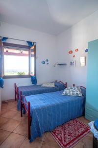 A bed or beds in a room at Maiorca Sea-view Apartment