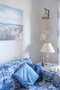 A bed or beds in a room at Maiorca Sea-view Apartment