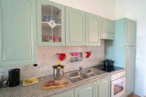 A kitchen or kitchenette at Maiorca Sea-view Apartment