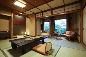 Posezení v ubytování Hotel Shirakawa Yunokura