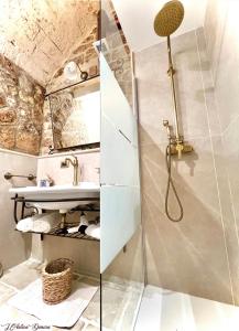 ein Bad mit einer Dusche und einem Waschbecken in der Unterkunft L’Antica Dimora in Bari