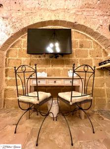 TV a/nebo společenská místnost v ubytování L’Antica Dimora