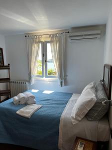 A bed or beds in a room at Il Nido a Portovenere