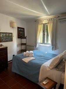 A bed or beds in a room at Il Nido a Portovenere