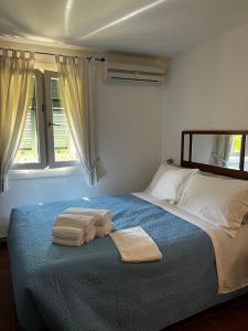 A bed or beds in a room at Il Nido a Portovenere