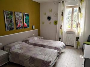 Postel nebo postele na pokoji v ubytování Casa Bine