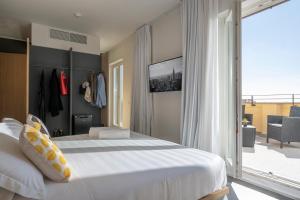 Posteľ alebo postele v izbe v ubytovaní Camplus Hotel Roma Centro