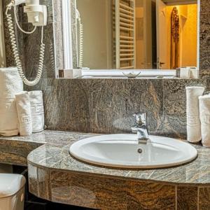 Koupelna v ubytování Grand Hotel Baroc
