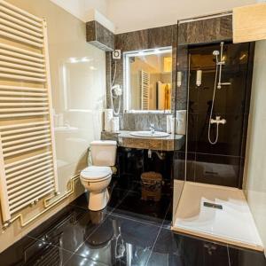 Koupelna v ubytování Grand Hotel Baroc