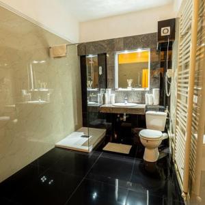 Koupelna v ubytování Grand Hotel Baroc