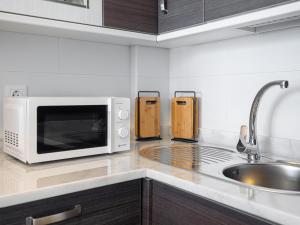 Kuchyňa alebo kuchynka v ubytovaní Small Oasis 2375 Sea View