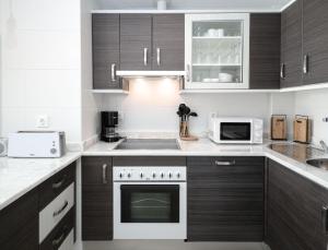 Kuchyňa alebo kuchynka v ubytovaní Small Oasis 2375 Sea View