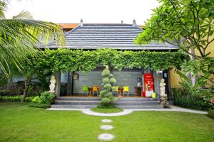 Zahrada ubytování Tanjung Sari Inn