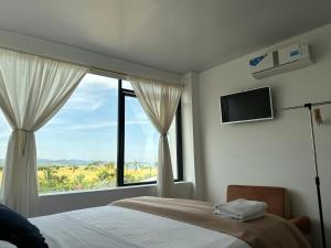 TV a/nebo společenská místnost v ubytování Hotel Punta Azul